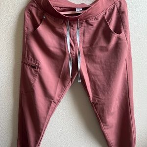 FIGS Women’s Zamora Joggers - Petite Medium in color MAUVE